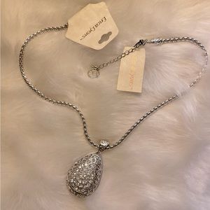 Necklace silver tone, large tear drop pendant. Erica Lyons. Faux diamond stones.